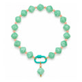 Mint green with peach accents acrylic beaded necklace with a mint-green rounded diamond pendant on a white background.