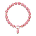 Pink acrylic beaded necklace with a pink oval pendant on a white background.