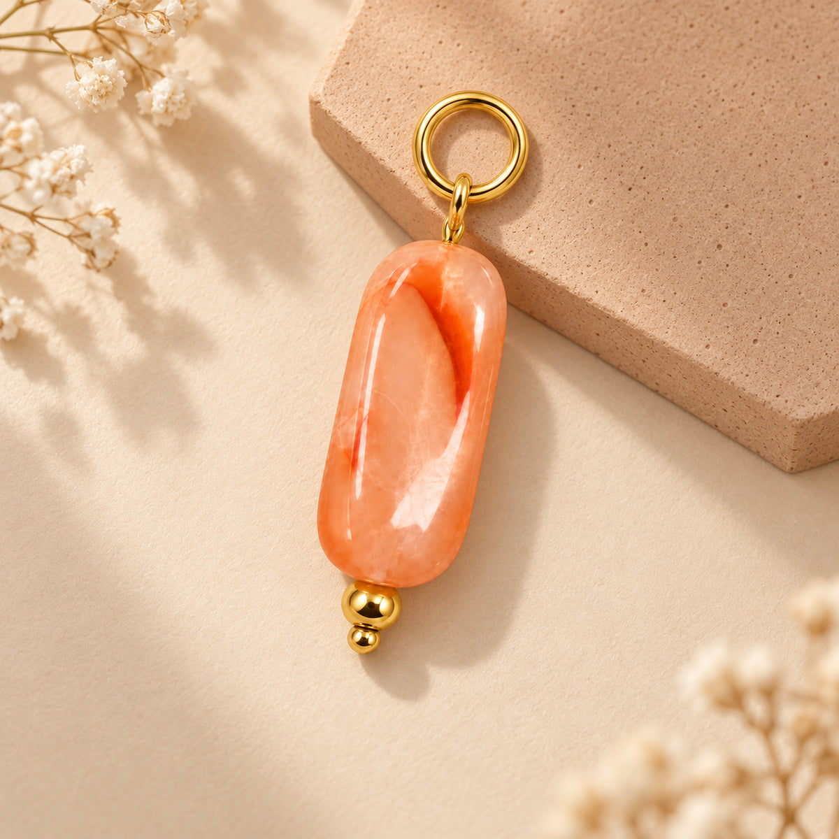 Coral Pink Oval Acrylic Pendant styled on a neutral background