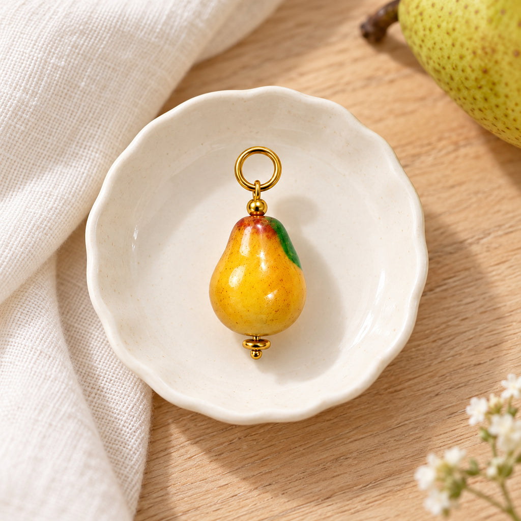 Golden Yellow Pear Acrylic Pendant styled on a neutral background