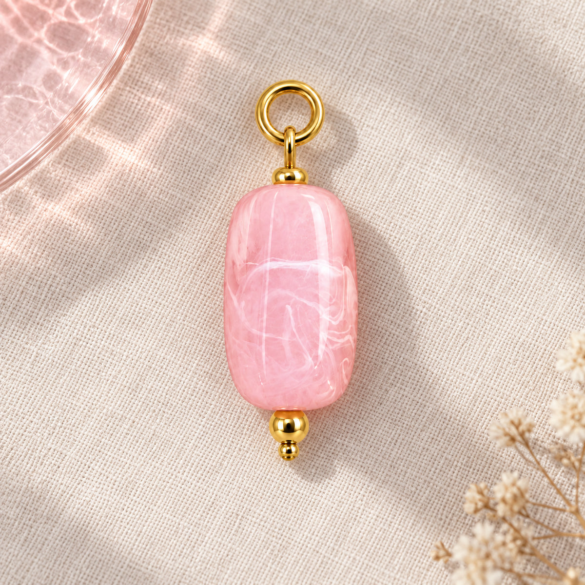 Pink Oval Acrylic Pendant styled on a neutral background