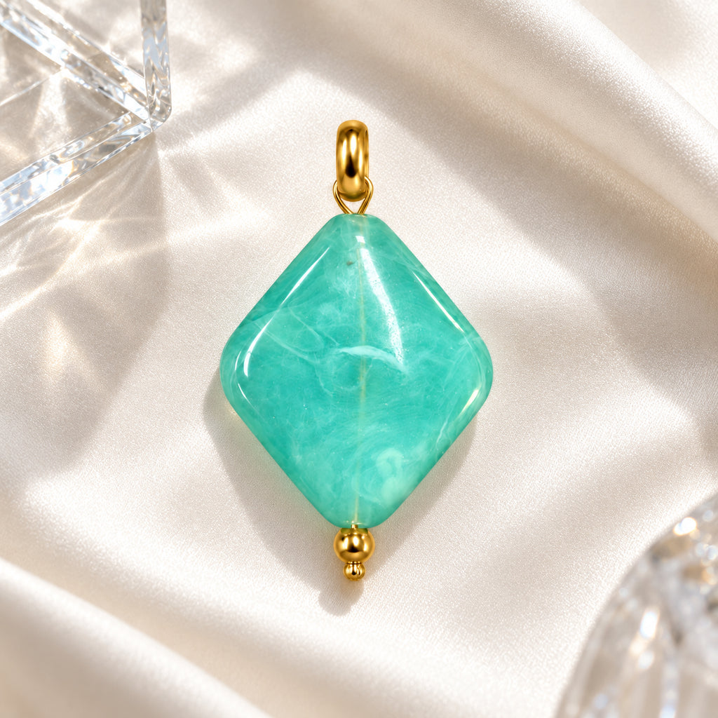 Turquoise Blue Diamond Acrylic Pendant styled on a neutral background