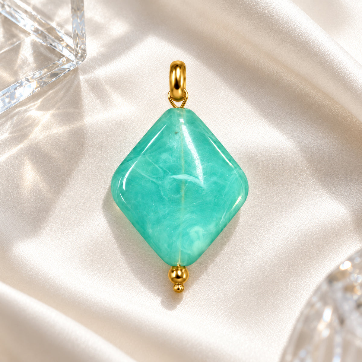 Turquoise Blue Diamond Acrylic Pendant styled on a neutral background