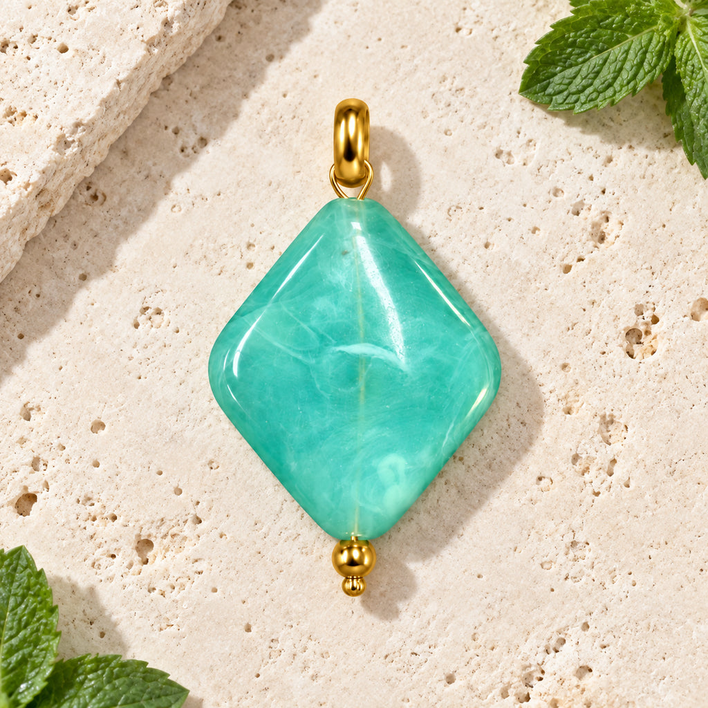 Turquoise Blue Diamond Acrylic Pendant styled on a neutral background
