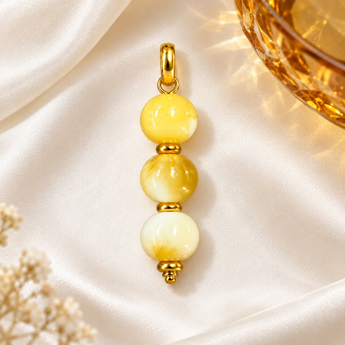 Yellow and Cream Beaded Acrylic Pendant styled on a neutral background